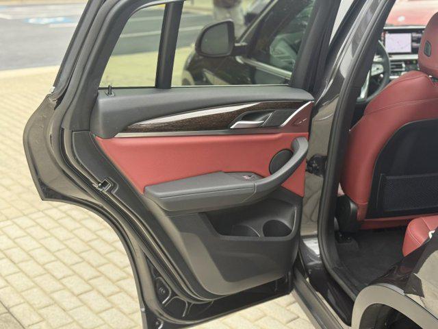 used 2024 BMW X4 car, priced at $49,990