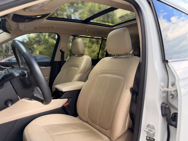 used 2021 Jeep Grand Cherokee L car, priced at $29,990