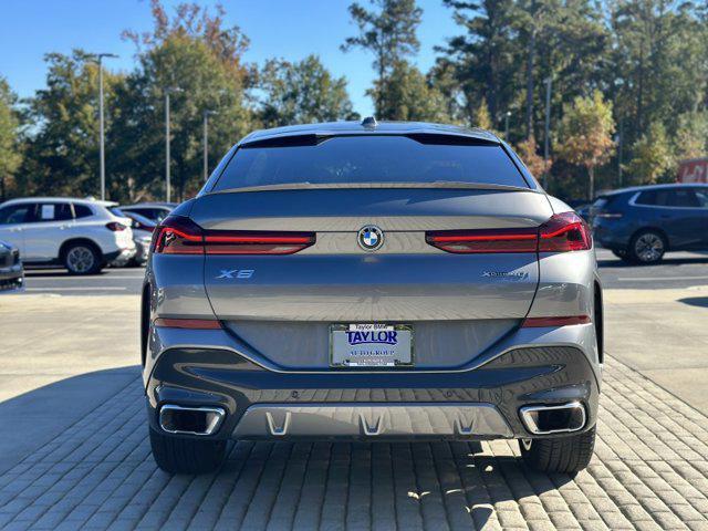 used 2024 BMW X6 car, priced at $64,990