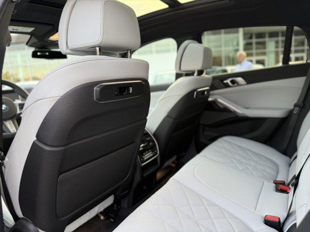 new 2026 BMW X6 car, priced at $90,475