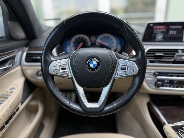 used 2018 BMW 750 car, priced at $33,990