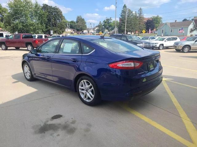 used 2014 Ford Fusion car, priced at $9,999