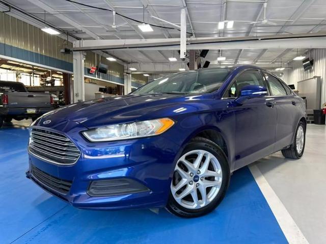 used 2014 Ford Fusion car, priced at $9,999