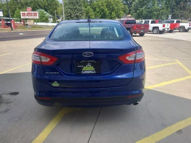 used 2014 Ford Fusion car, priced at $9,999