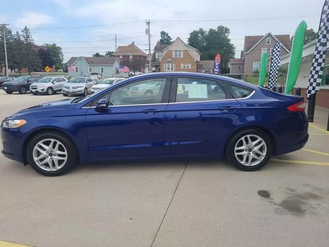 used 2014 Ford Fusion car, priced at $9,999