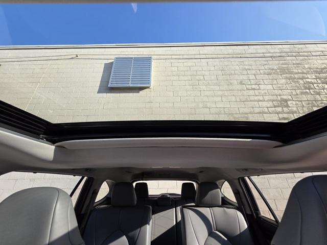 used 2021 Toyota Highlander Hybrid car, priced at $29,999