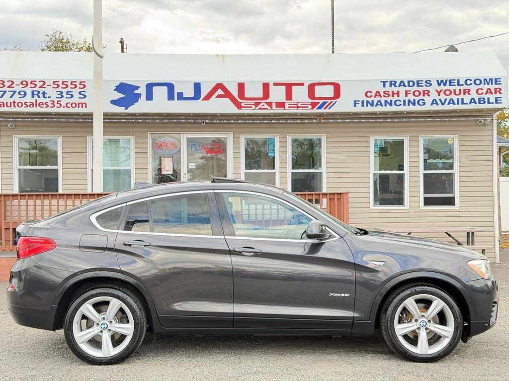 used 2015 BMW X4 car, priced at $15,995
