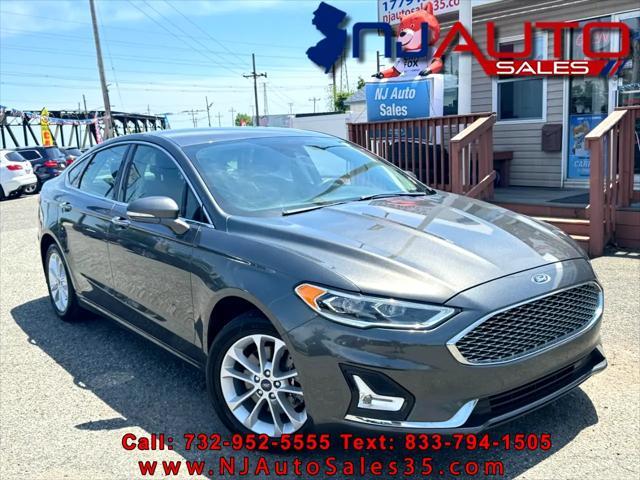 used 2019 Ford Fusion Energi car, priced at $15,795