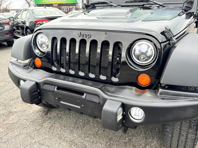 used 2013 Jeep Wrangler Unlimited car, priced at $18,995