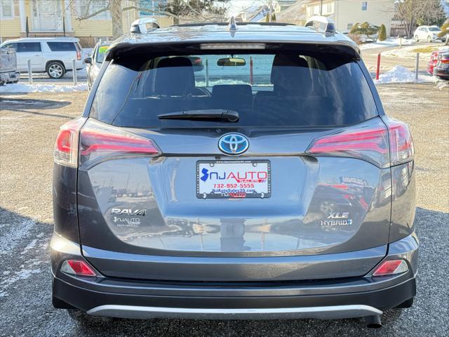 used 2016 Toyota RAV4 Hybrid car, priced at $15,495