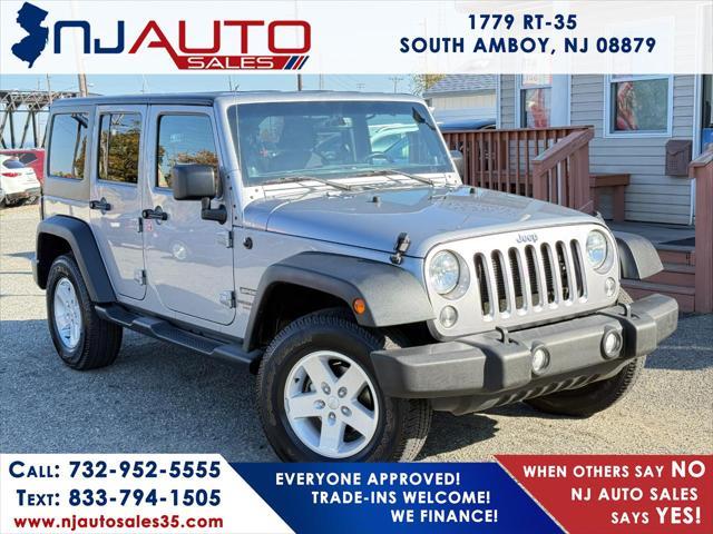 used 2014 Jeep Wrangler Unlimited car, priced at $15,995