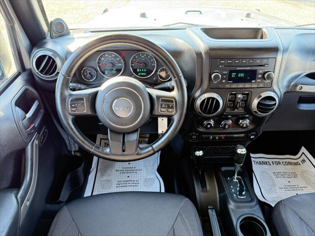 used 2014 Jeep Wrangler Unlimited car, priced at $16,995