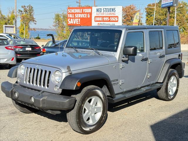 used 2014 Jeep Wrangler Unlimited car, priced at $15,495