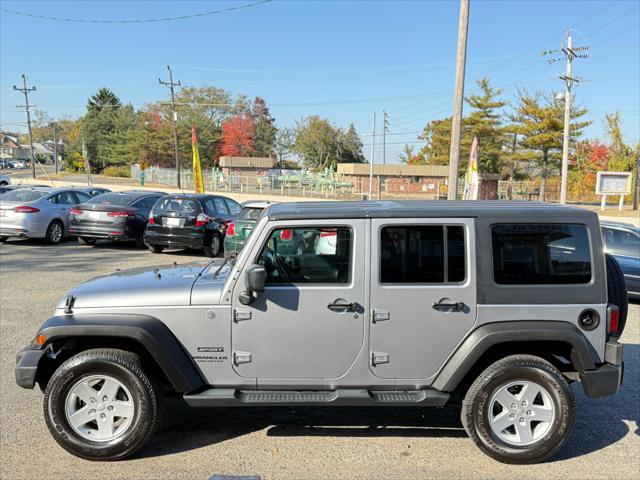 used 2014 Jeep Wrangler Unlimited car, priced at $15,495