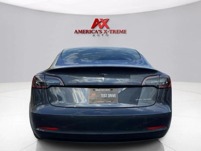 used 2022 Tesla Model 3 car, priced at $27,999