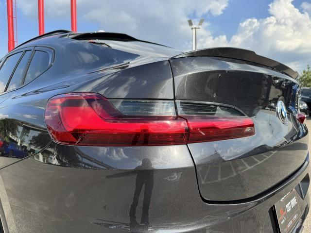 used 2020 BMW X4 M car, priced at $38,999