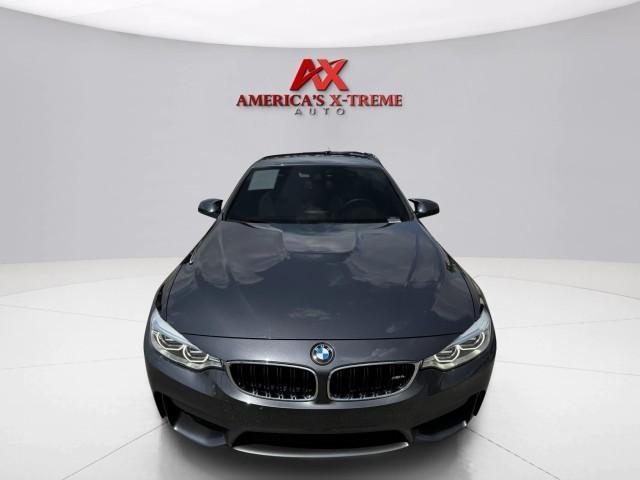 used 2015 BMW M4 car, priced at $27,499