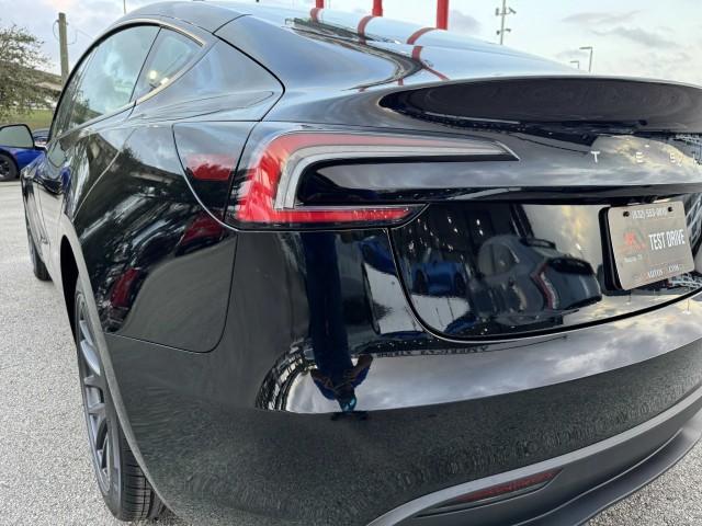 used 2024 Tesla Model 3 car, priced at $29,599