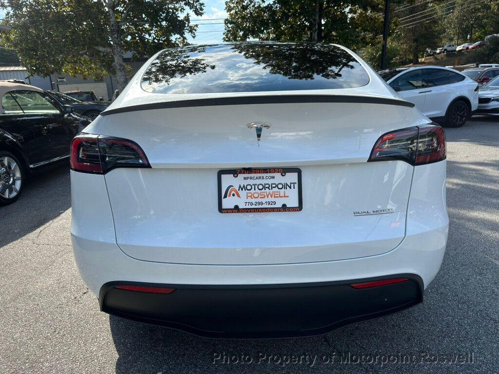 used 2024 Tesla Model Y car, priced at $35,999