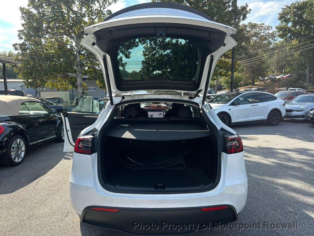 used 2024 Tesla Model Y car, priced at $35,999