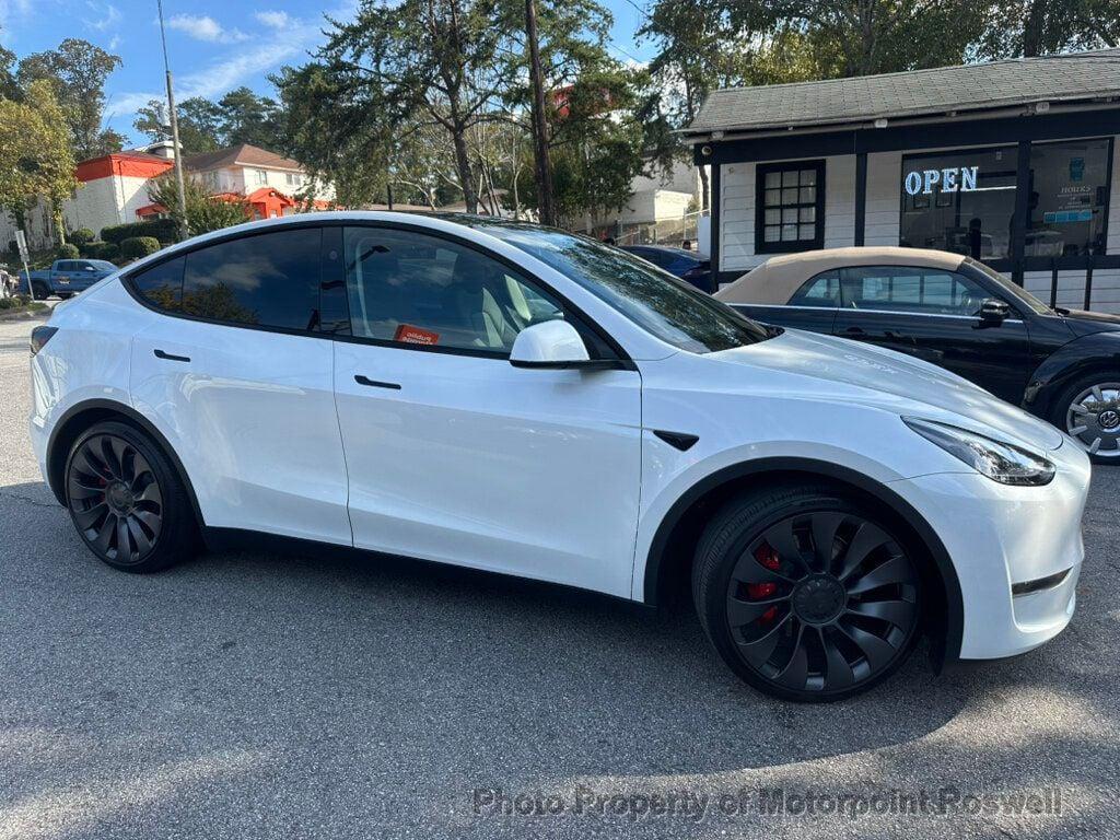 used 2024 Tesla Model Y car, priced at $35,999