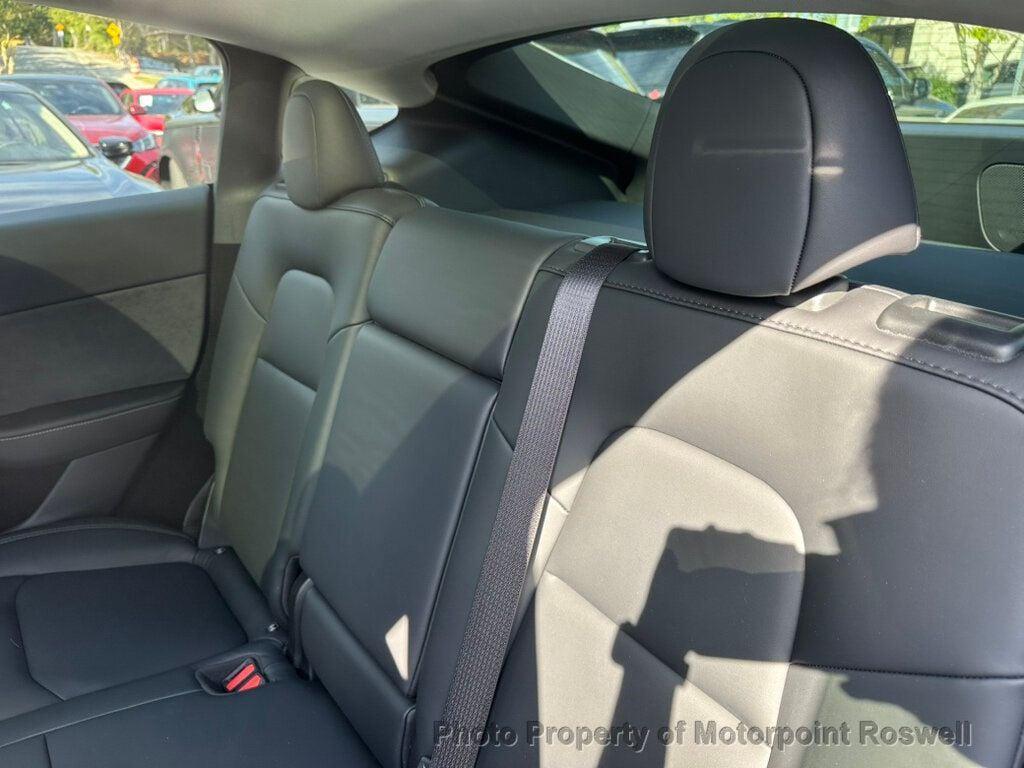 used 2024 Tesla Model Y car, priced at $35,999