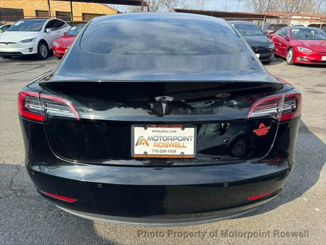 used 2021 Tesla Model 3 car, priced at $16,999