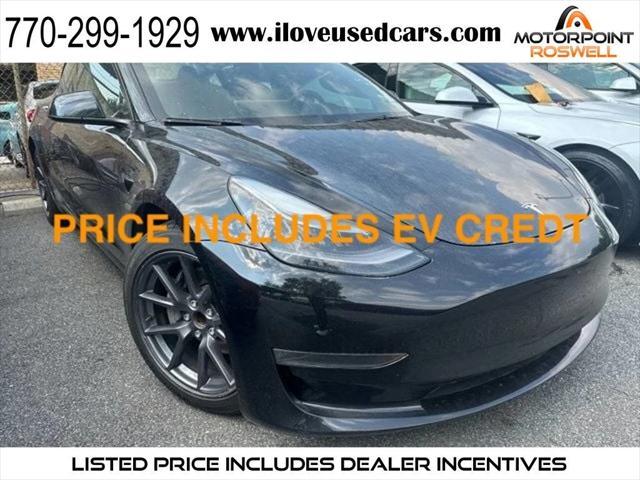 used 2023 Tesla Model 3 car, priced at $17,999