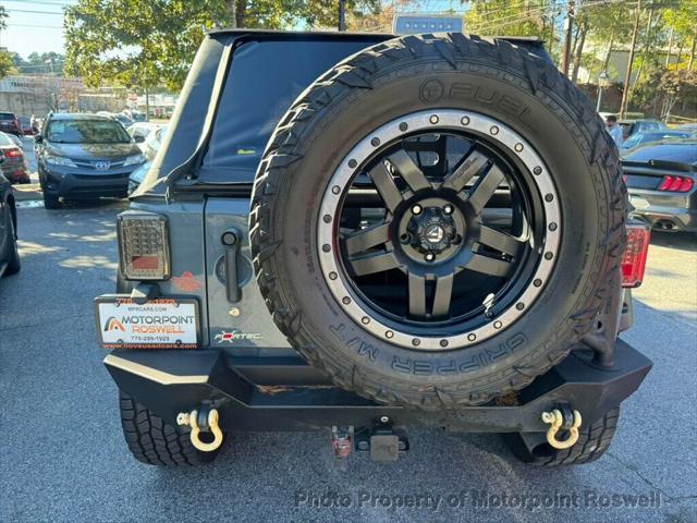 used 2015 Jeep Wrangler Unlimited car, priced at $18,499