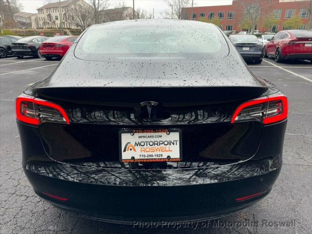 used 2023 Tesla Model 3 car, priced at $26,999