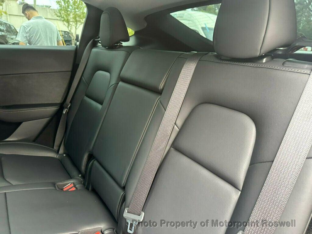 used 2024 Tesla Model Y car, priced at $34,499