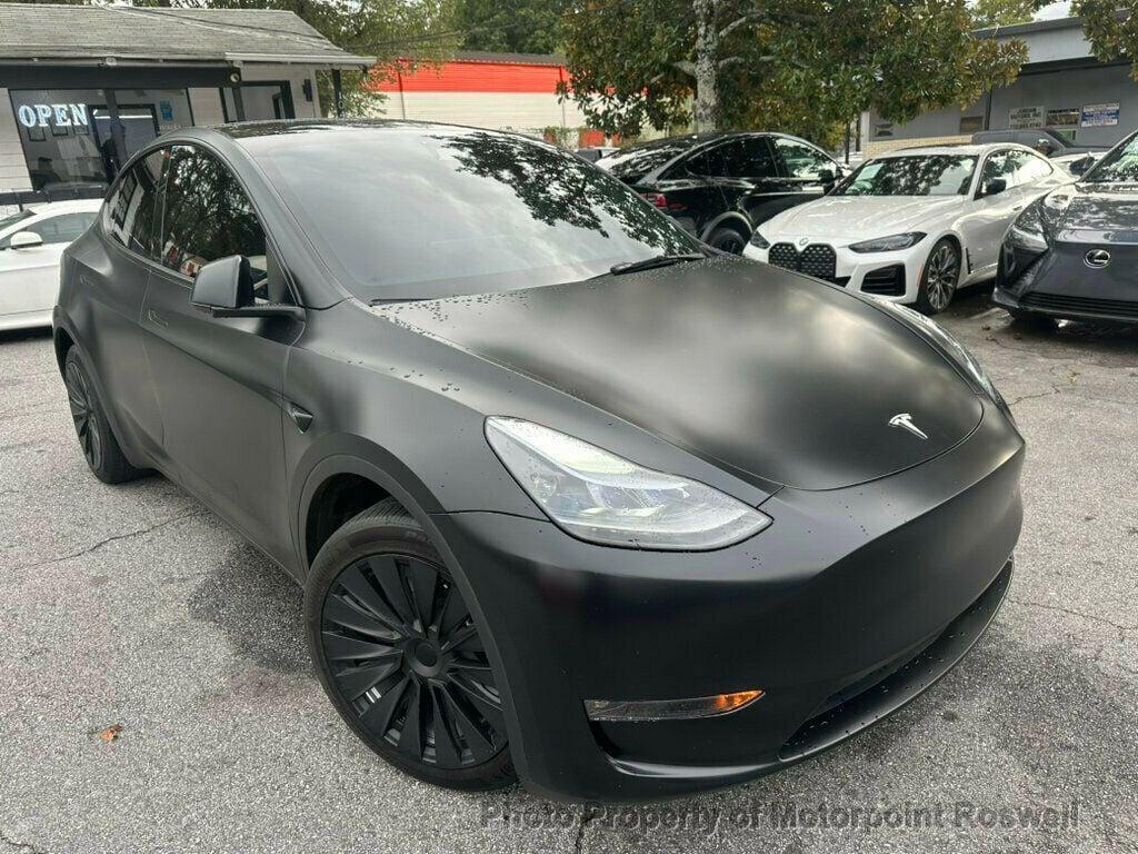 used 2024 Tesla Model Y car, priced at $34,499