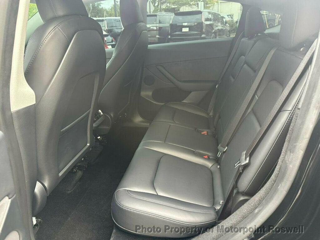 used 2024 Tesla Model Y car, priced at $34,499