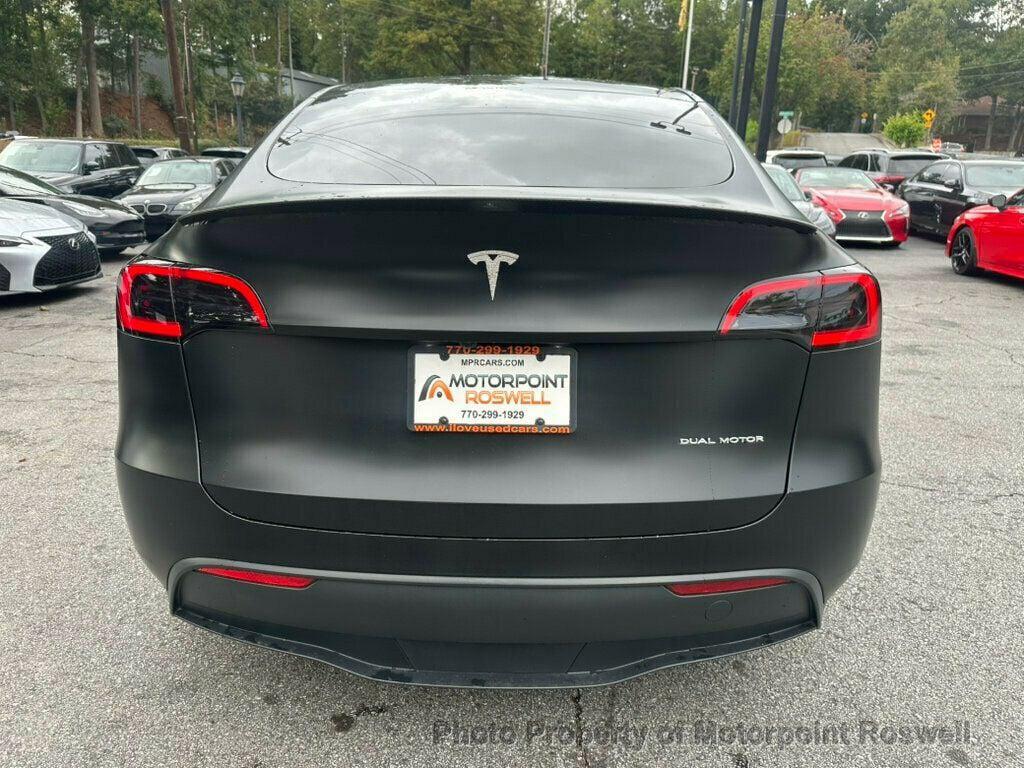 used 2024 Tesla Model Y car, priced at $34,499