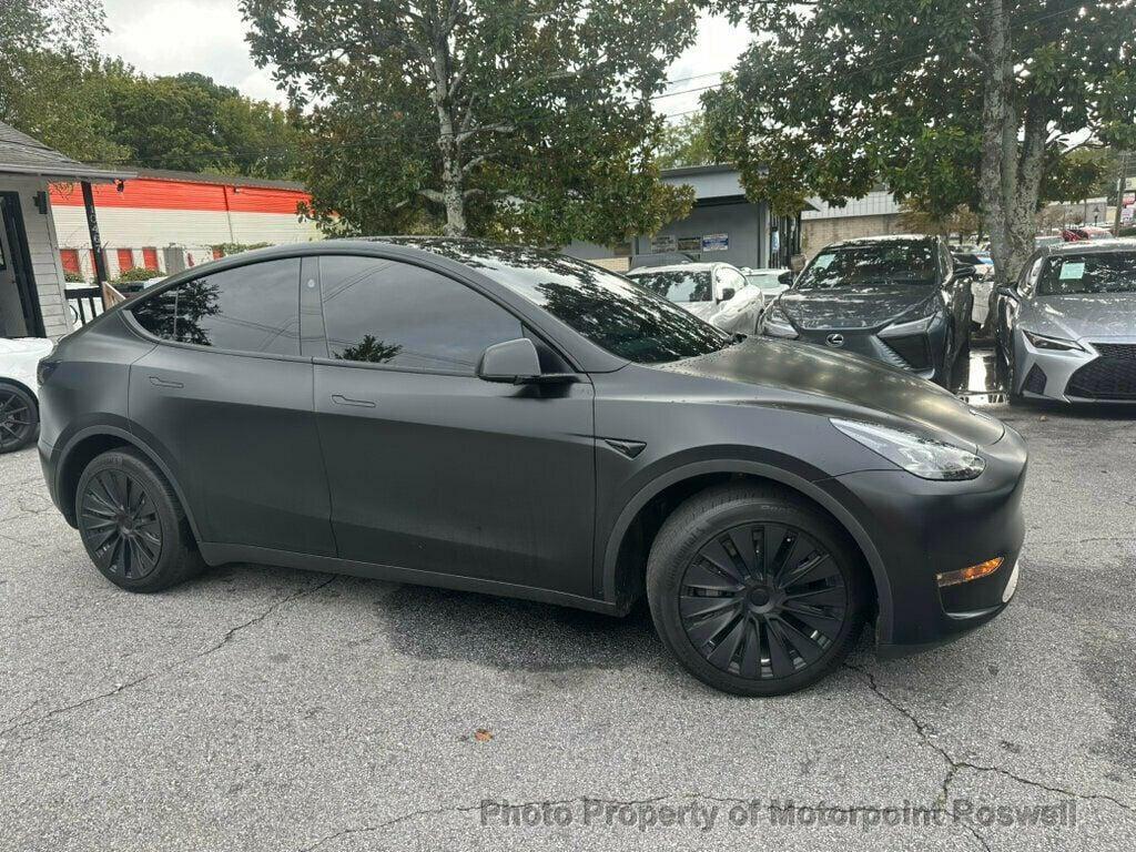 used 2024 Tesla Model Y car, priced at $34,499
