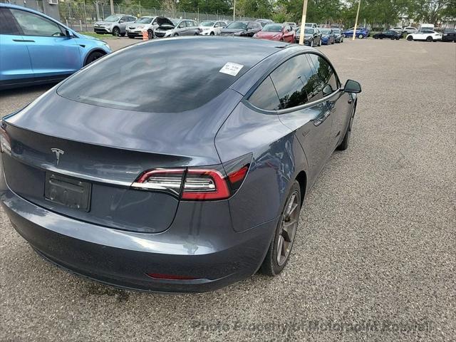 used 2023 Tesla Model 3 car, priced at $17,999