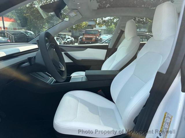 used 2026 Tesla Model Y car, priced at $53,999
