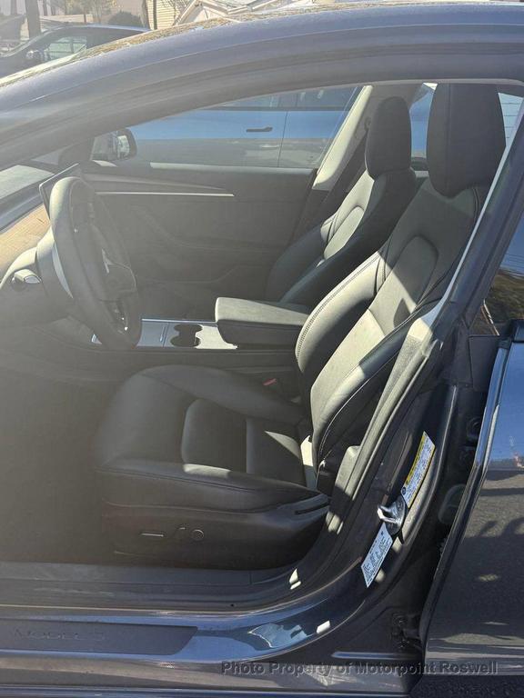 used 2023 Tesla Model 3 car, priced at $19,999