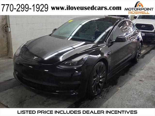 used 2022 Tesla Model 3 car, priced at $27,999