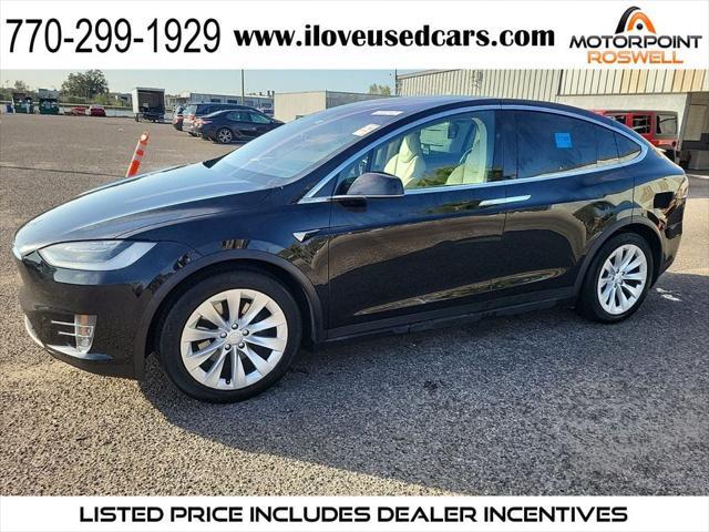 used 2018 Tesla Model X car, priced at $30,999