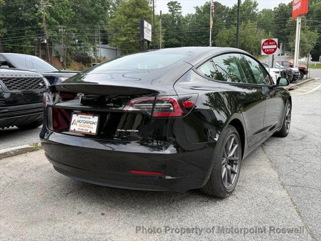 used 2022 Tesla Model 3 car, priced at $21,999