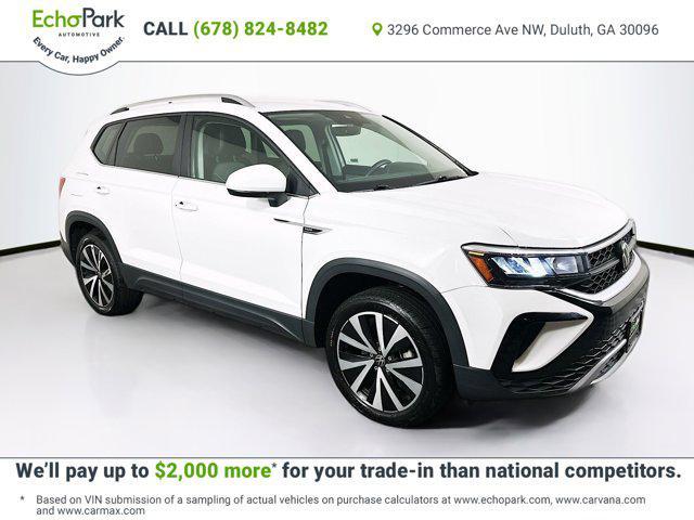 used 2024 Volkswagen Taos car, priced at $18,397