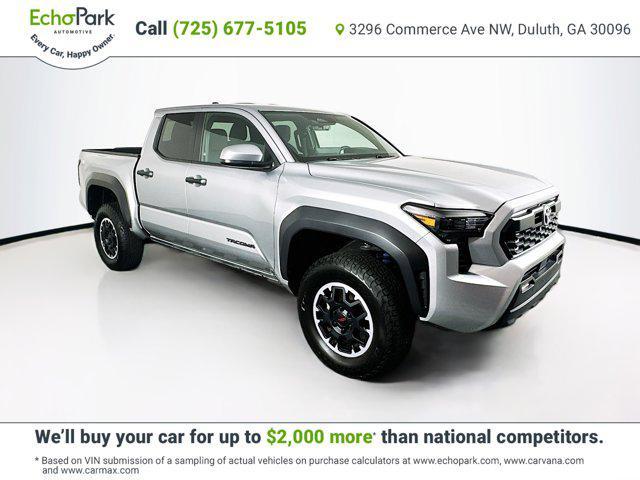 used 2024 Toyota Tacoma car, priced at $38,999