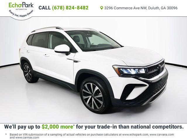 used 2024 Volkswagen Taos car, priced at $18,197
