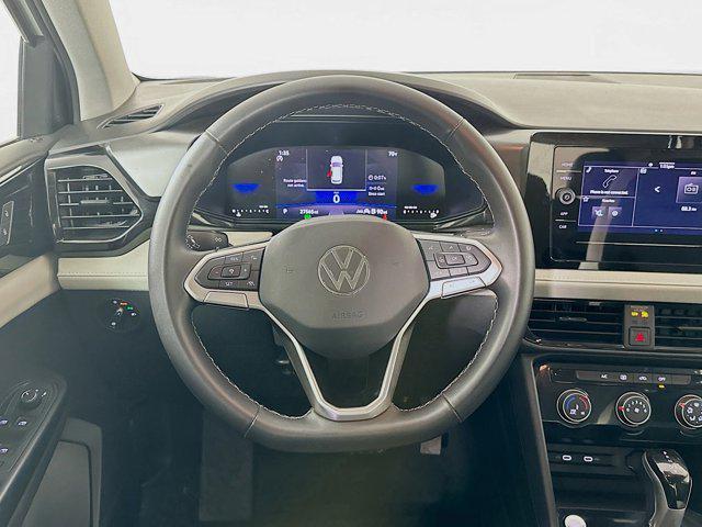 used 2025 Volkswagen Taos car, priced at $20,697