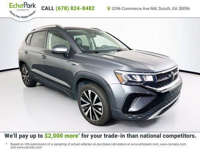 used 2024 Volkswagen Taos car, priced at $20,197