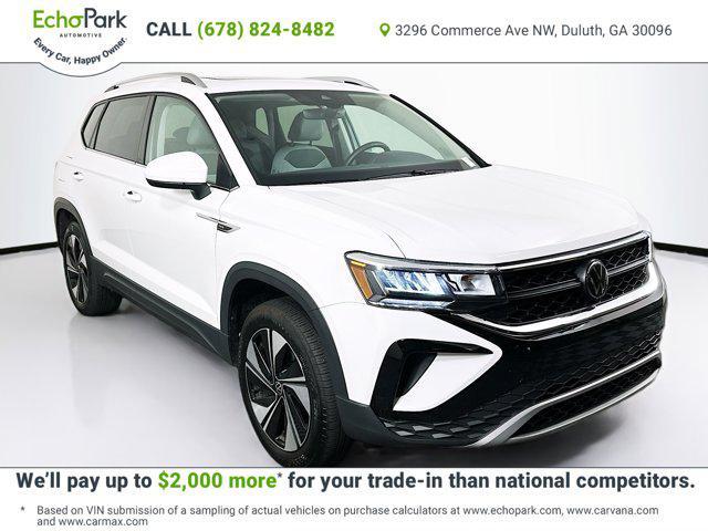 used 2024 Volkswagen Taos car, priced at $21,387