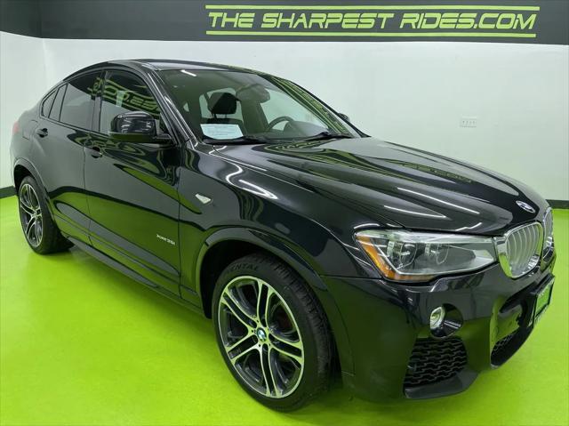 used 2015 BMW X4 car, priced at $17,988