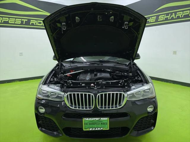 used 2015 BMW X4 car, priced at $17,988