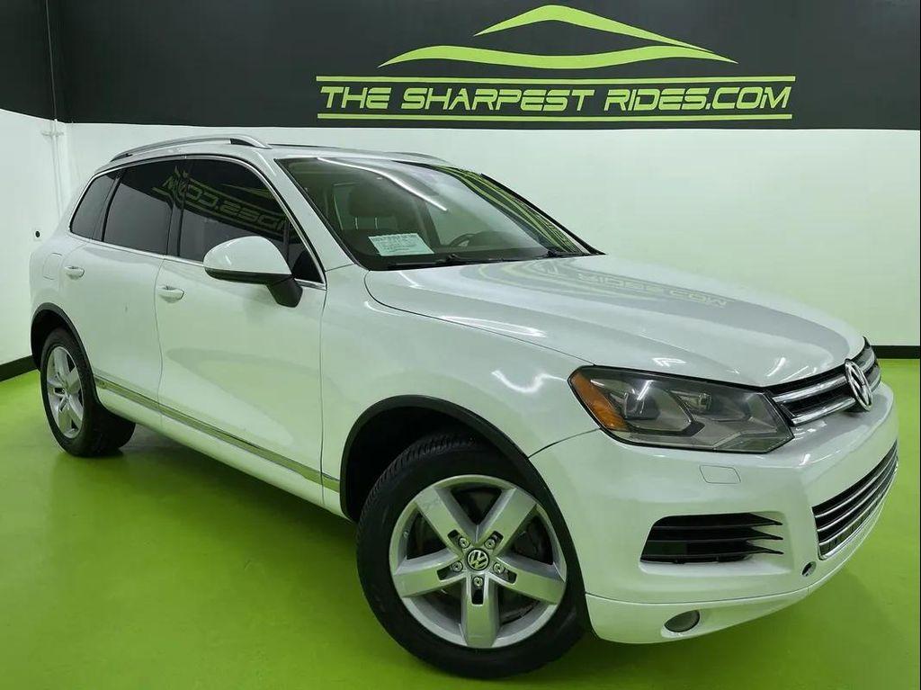 used 2012 Volkswagen Touareg Hybrid car, priced at $10,988